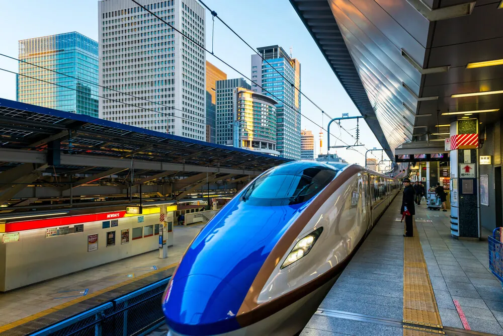 Shinkansen bullet train waiting at a platform in Tokyo